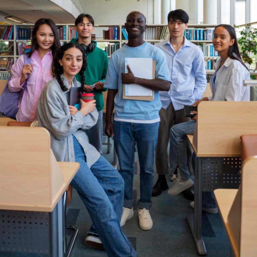 jpeg-optimizer_full-shot-smiley-students-library (1)